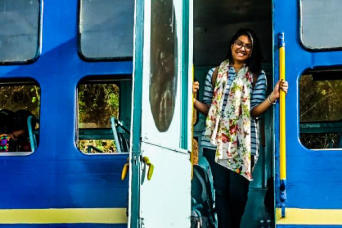 Trip to Ooty Toy train stopped at station with beautiful views of a tea estate